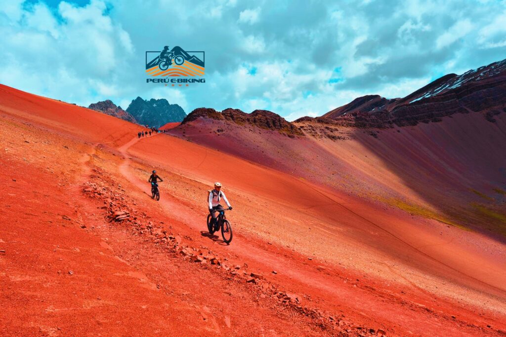 rainbow mountain and Red Valley ebiking tour mtb en bicicleta cusco peru ebiking